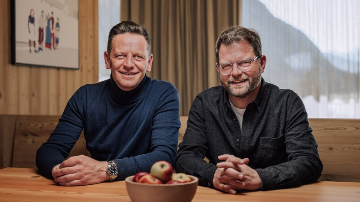 Two men on a table.